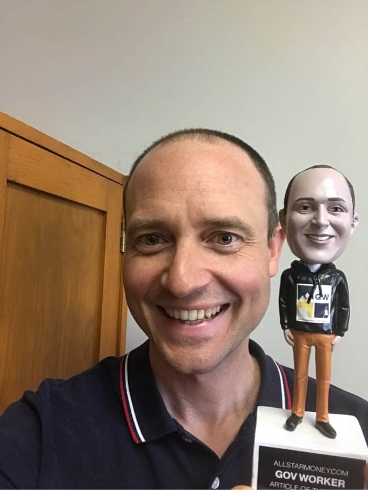 gov worker with a bobblehead